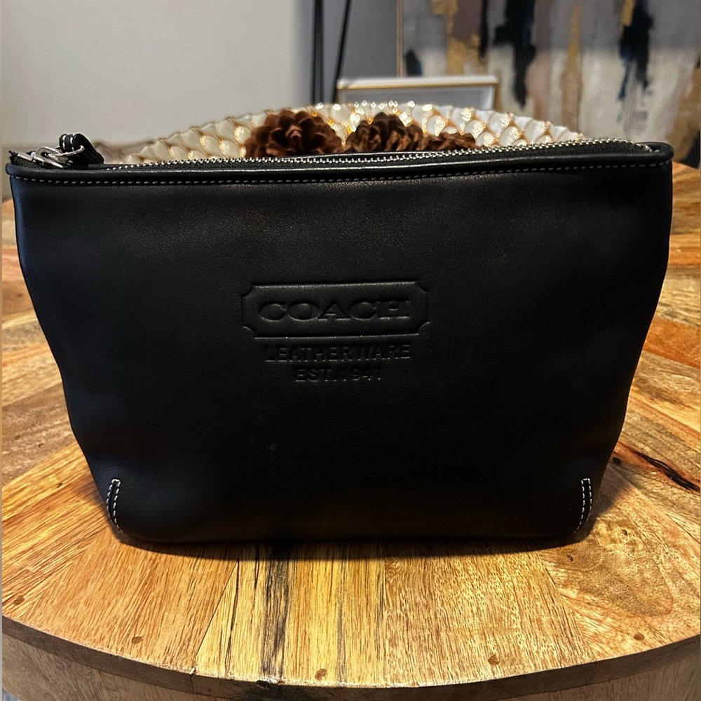 Coach leather travel bag.